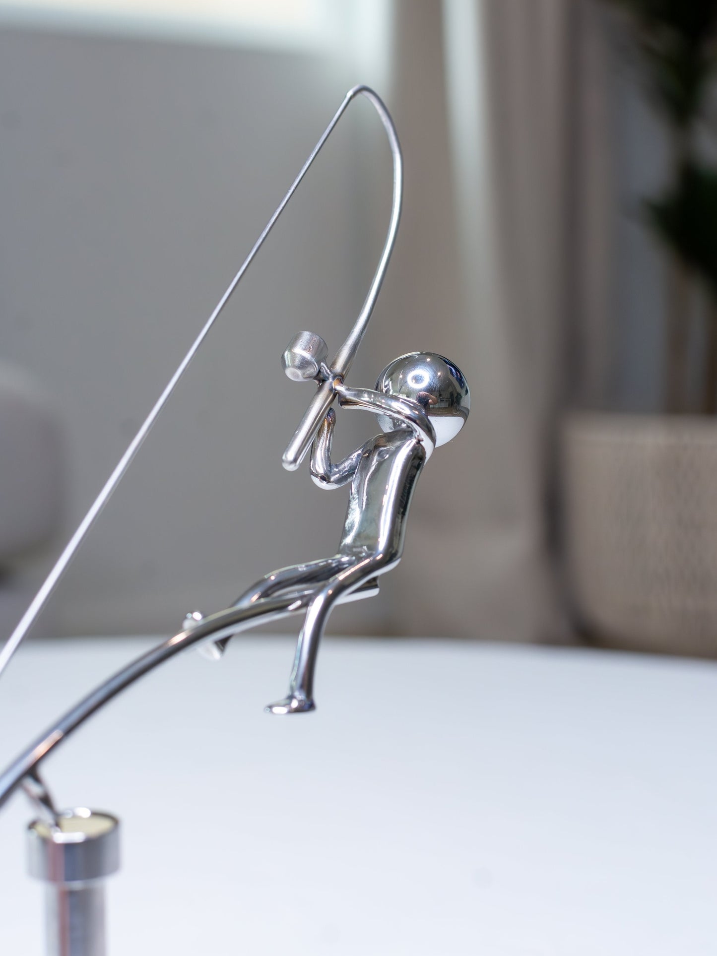 🎣Skulpturen ”Fiskaren i balans”
