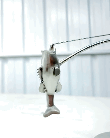 🎣Skulpturen ”Fiskaren i balans”