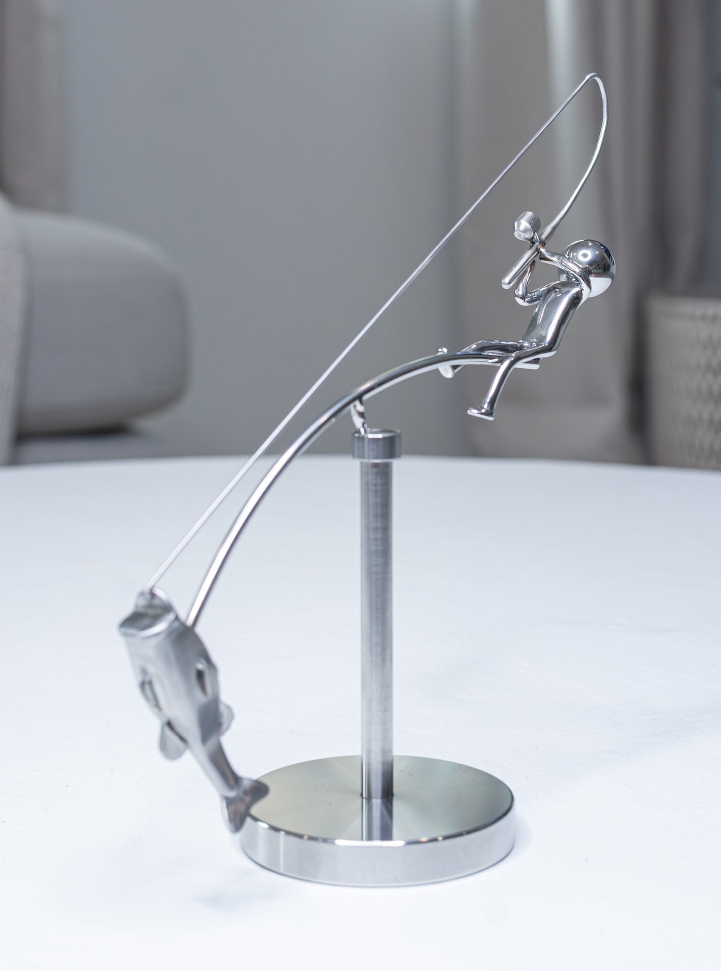 🎣Skulpturen ”Fiskaren i balans”
